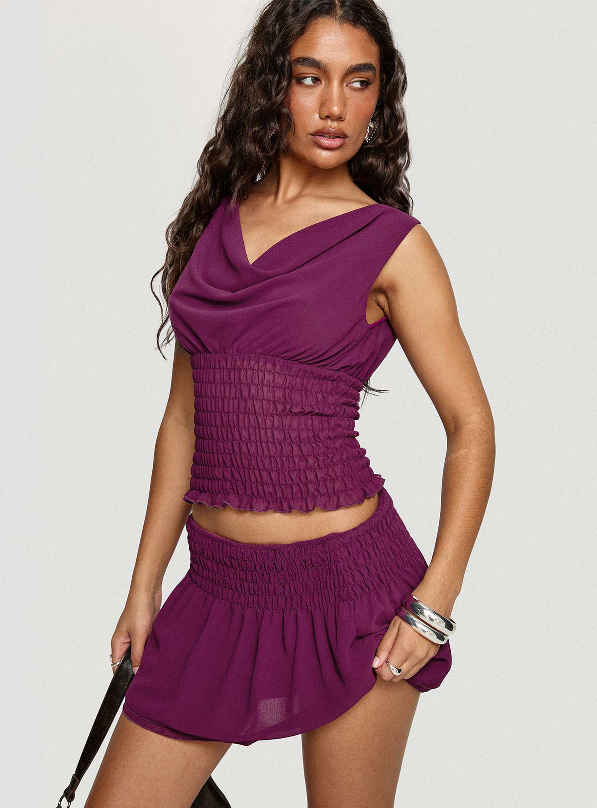   side view of model wearing Princess Polly I Belong Shirred Mini Skirt Wine Mini Skirts 