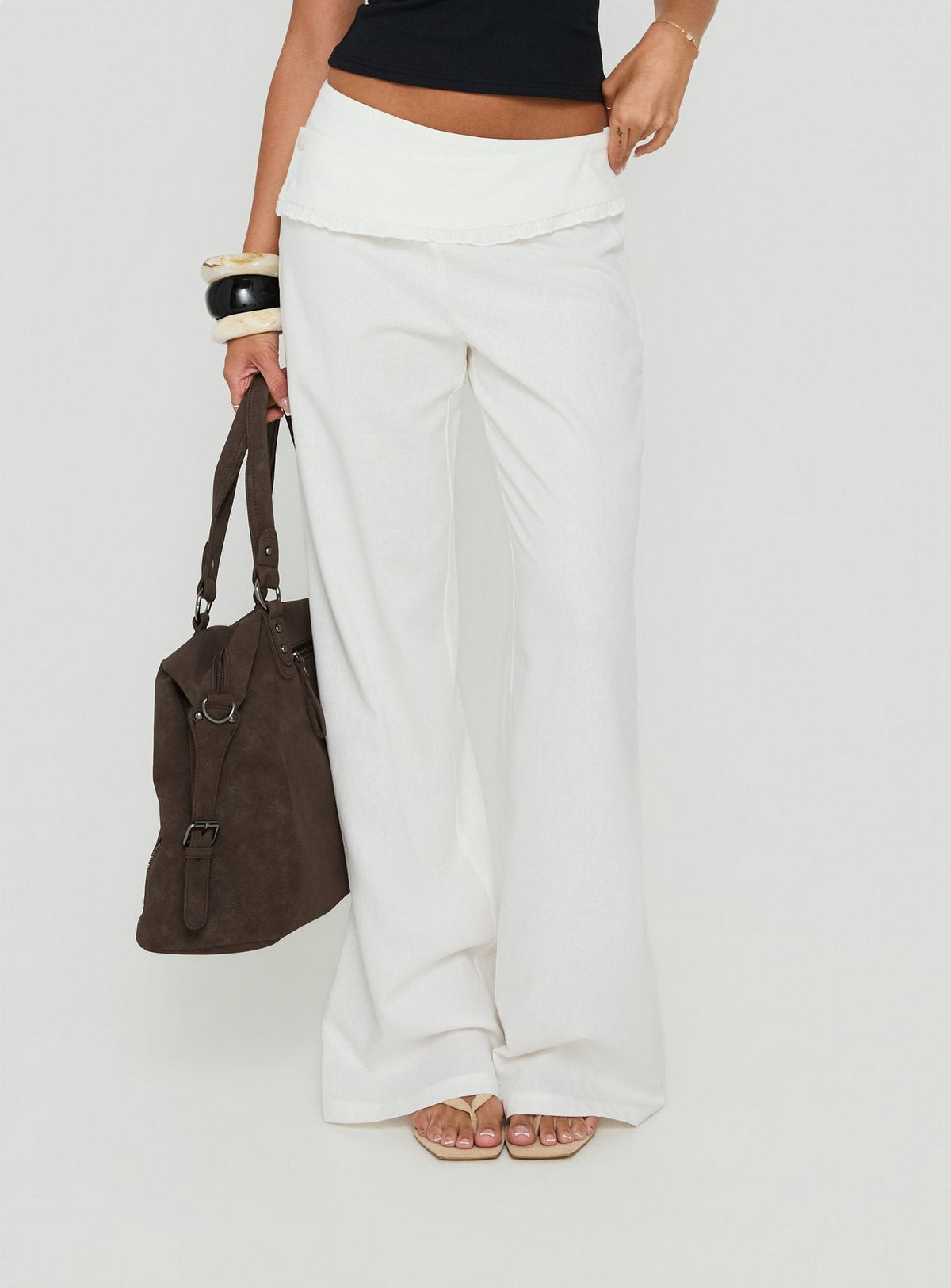 Featuring the Brea Frill Belted Pants White womens-regular-pants with high-rise detail view of model wearing