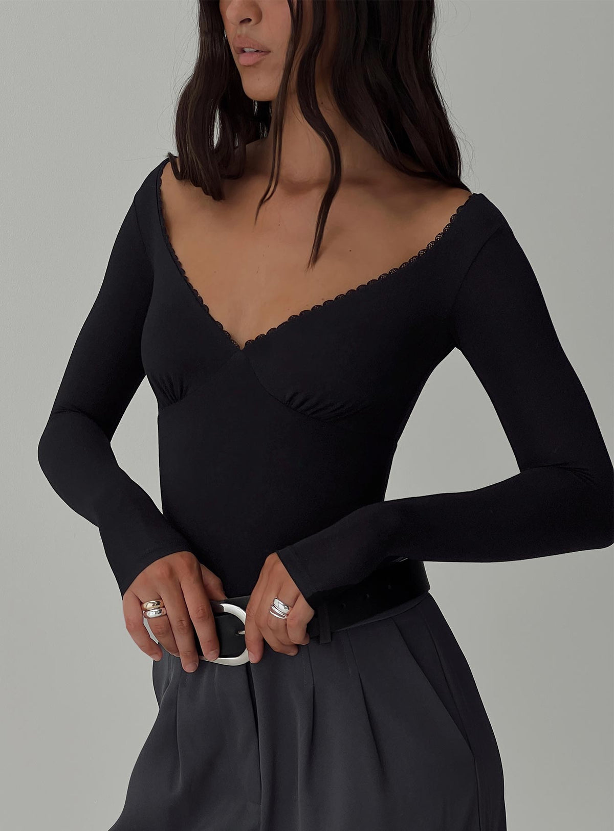 front view of model wearing Princess Polly Loveydove Bodysuit Black Long Sleeve Tops 