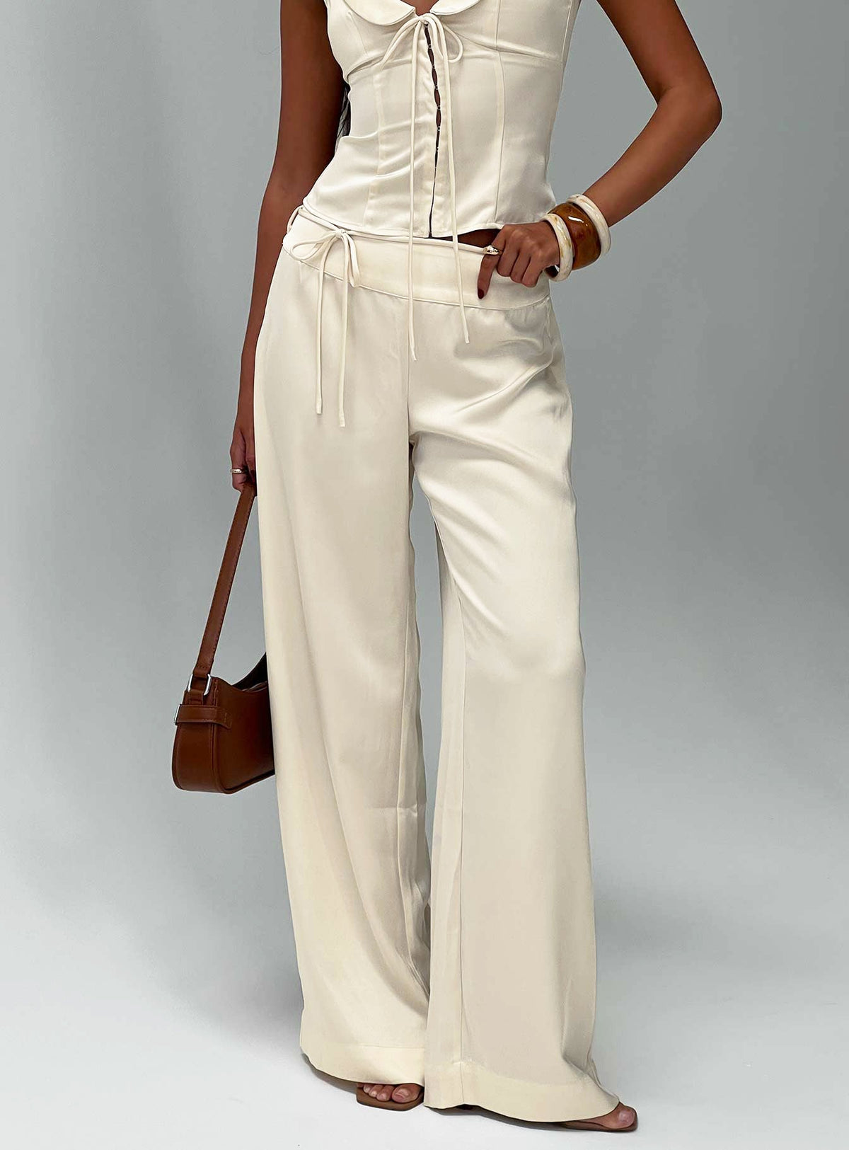 front view of model wearing Princess Polly Aubrette Satin Tie Pants Cream High Rise Pants 