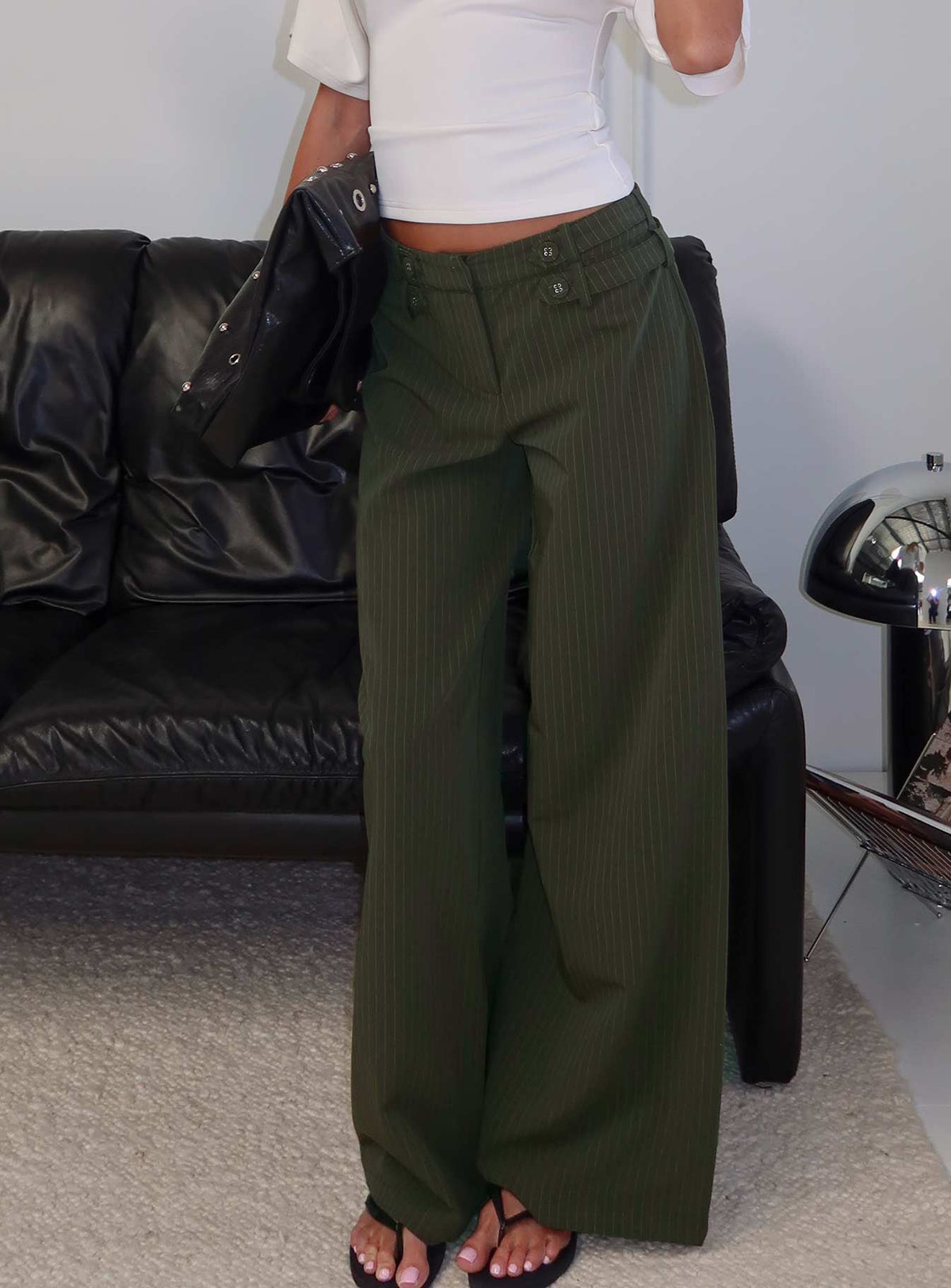back view of model wearing Princess Polly Jette Tailored Buckle Pant Green Pinstripe High Rise Pants 