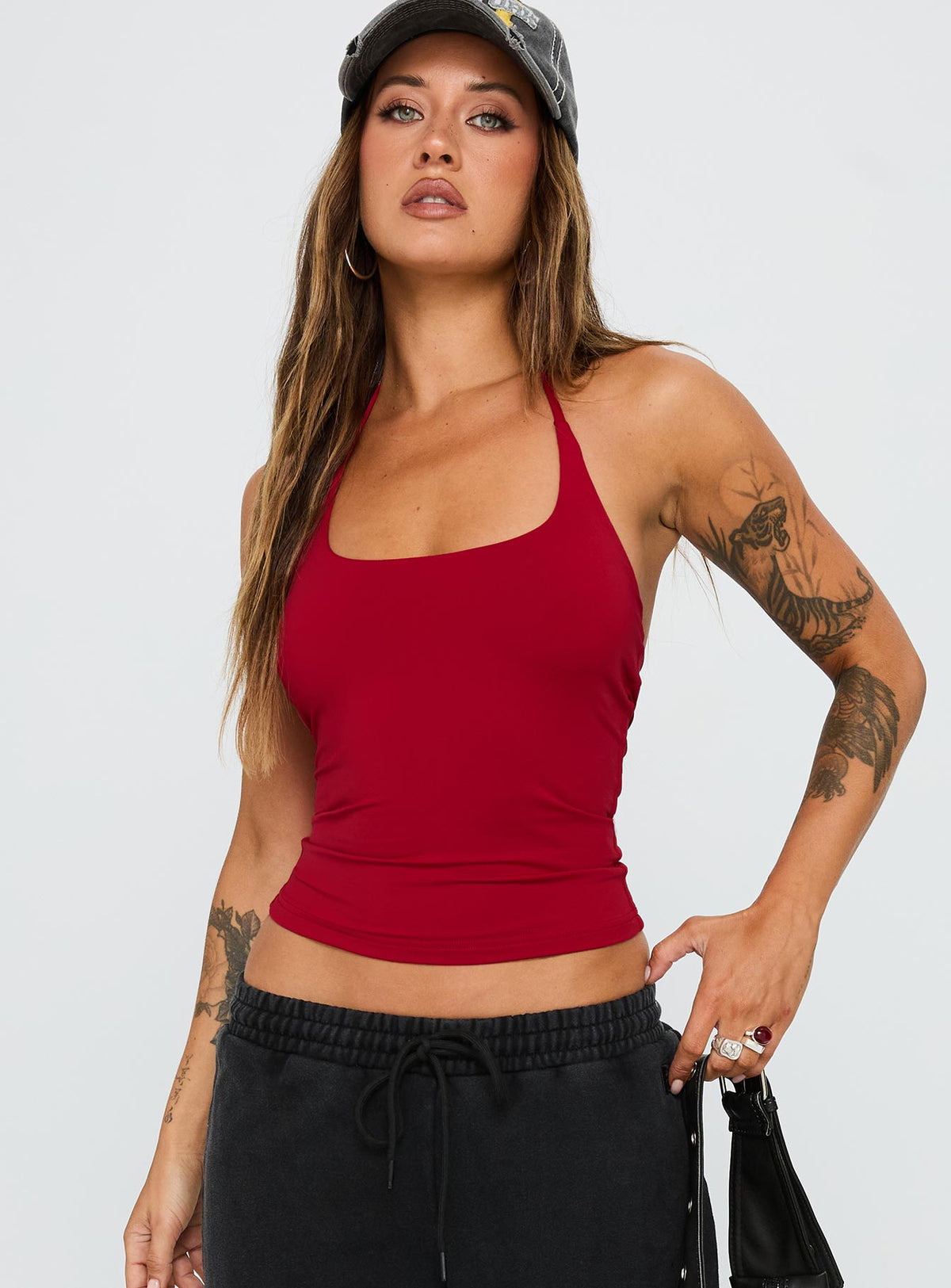 front view of model wearing Princess Polly Ezekiel Nylon Top Red Sleeveless Scoop Neck 