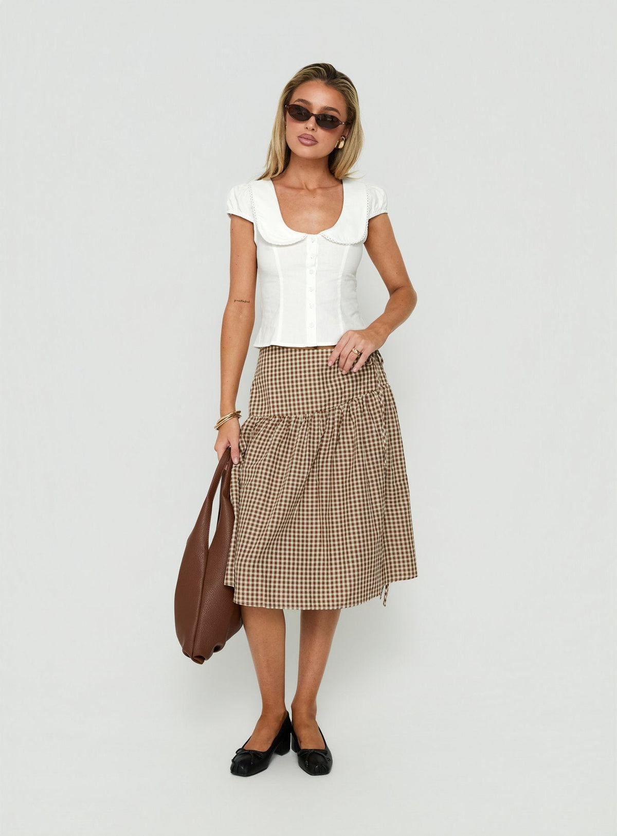 Showcasing the Kasida Tie Detail Midi Skirt Brown Check in womens-skirts with midi length product Princess Polly