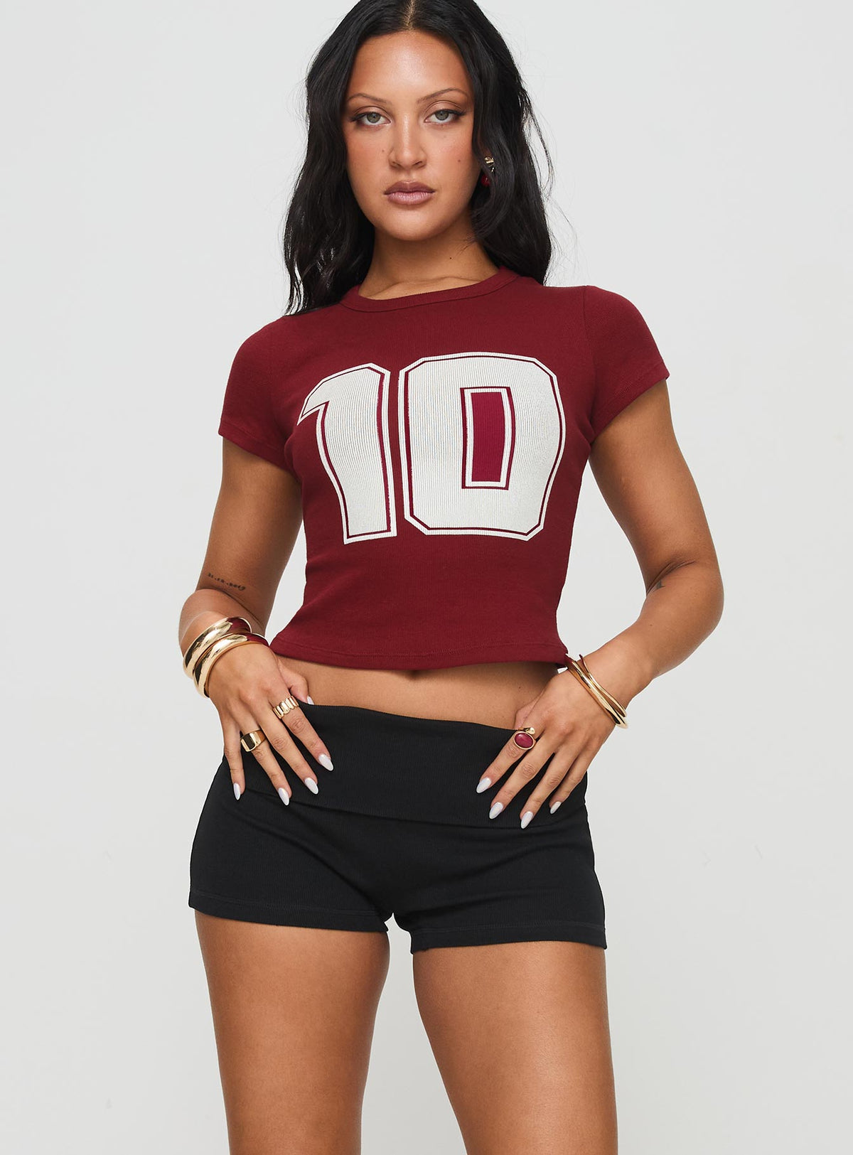 front view of model wearing Princess Polly Baseline Low Rise Rib Shorts Black High Waisted Shorts 