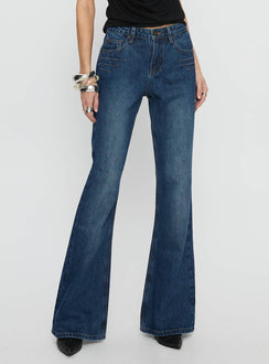 back view of model wearing Princess Polly Wide World Mid Rise Bootleg Jeans Mid Blue Mid Rise Jeans 