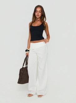 Showcasing the Brea Frill Belted Pants White womens-regular-pants with high-rise front view of model wearing