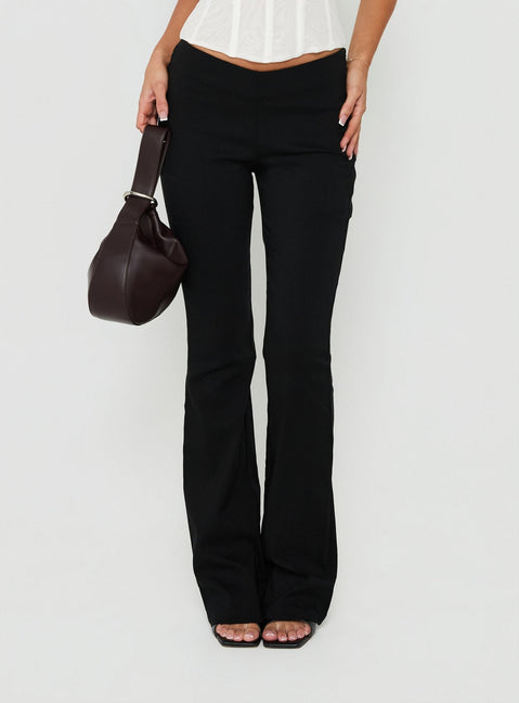 Showcasing the Zeni V Waist Bootleg Pants Black womens-regular-pants in mid-rise product view of model wearing