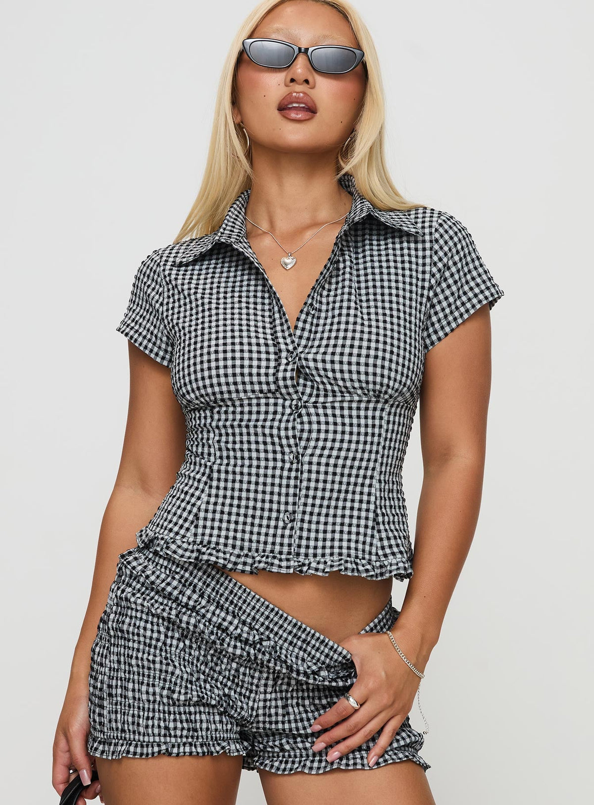 front view of model wearing Princess Polly Covey Shirred Puff Sleeve Top Multi Short Sleeves High Neck 