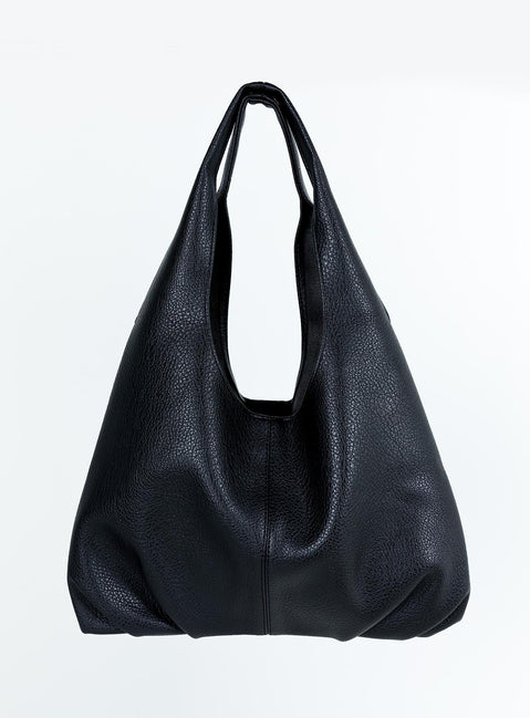 Shoulder bag Faux leather material Twin fixed handles Magnetic button fastening Separate clutch with zip fastening Gold toned hardware