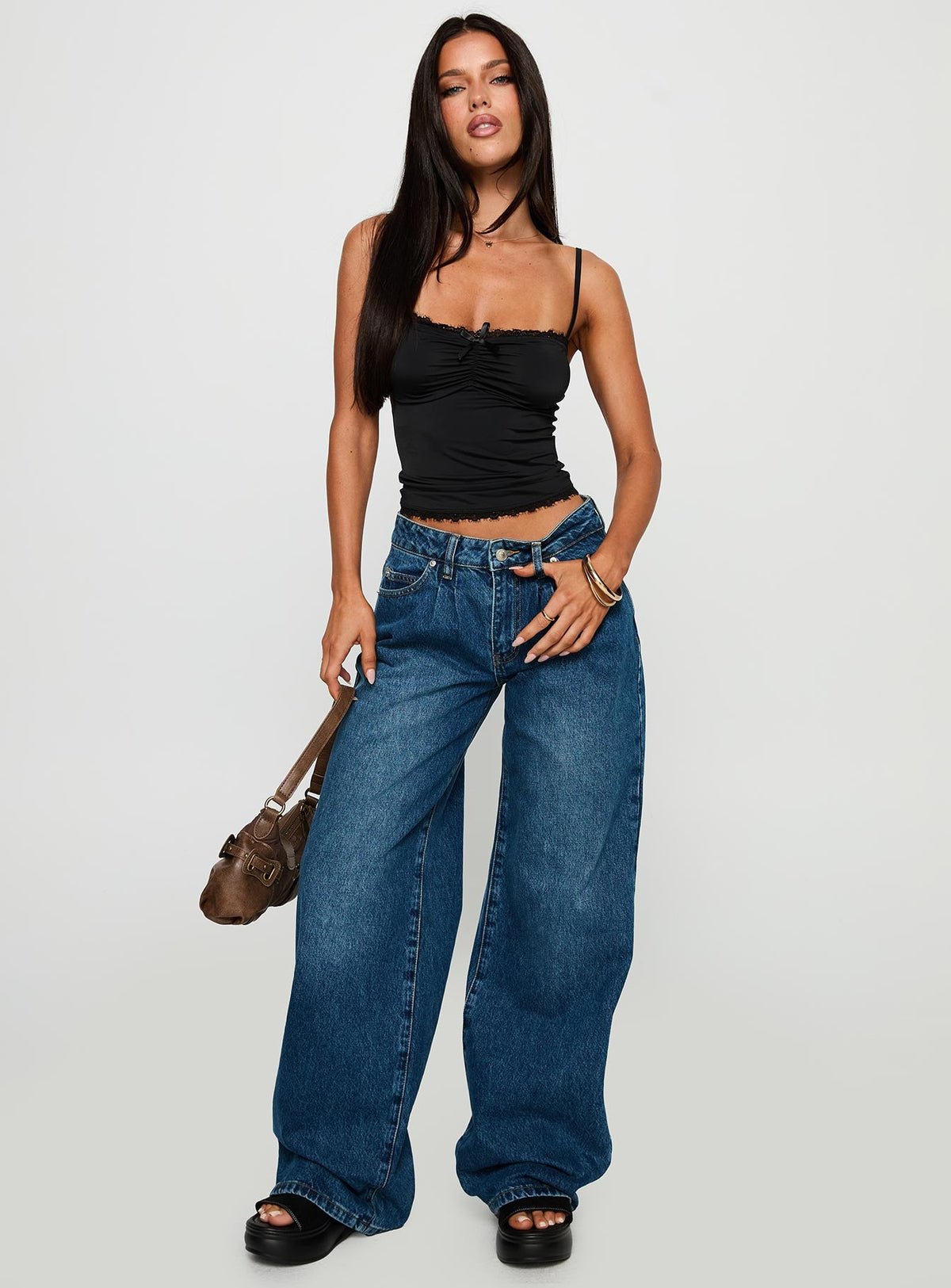 front view of model wearing Princess Polly Duster Oversized Jeans Dark Wash Mid Rise 