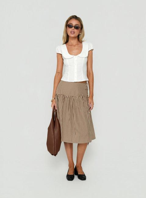 Designed with the Kasida Tie Detail Midi Skirt Brown Check in womens-skirts with midi length side view of model wearing Princess Polly