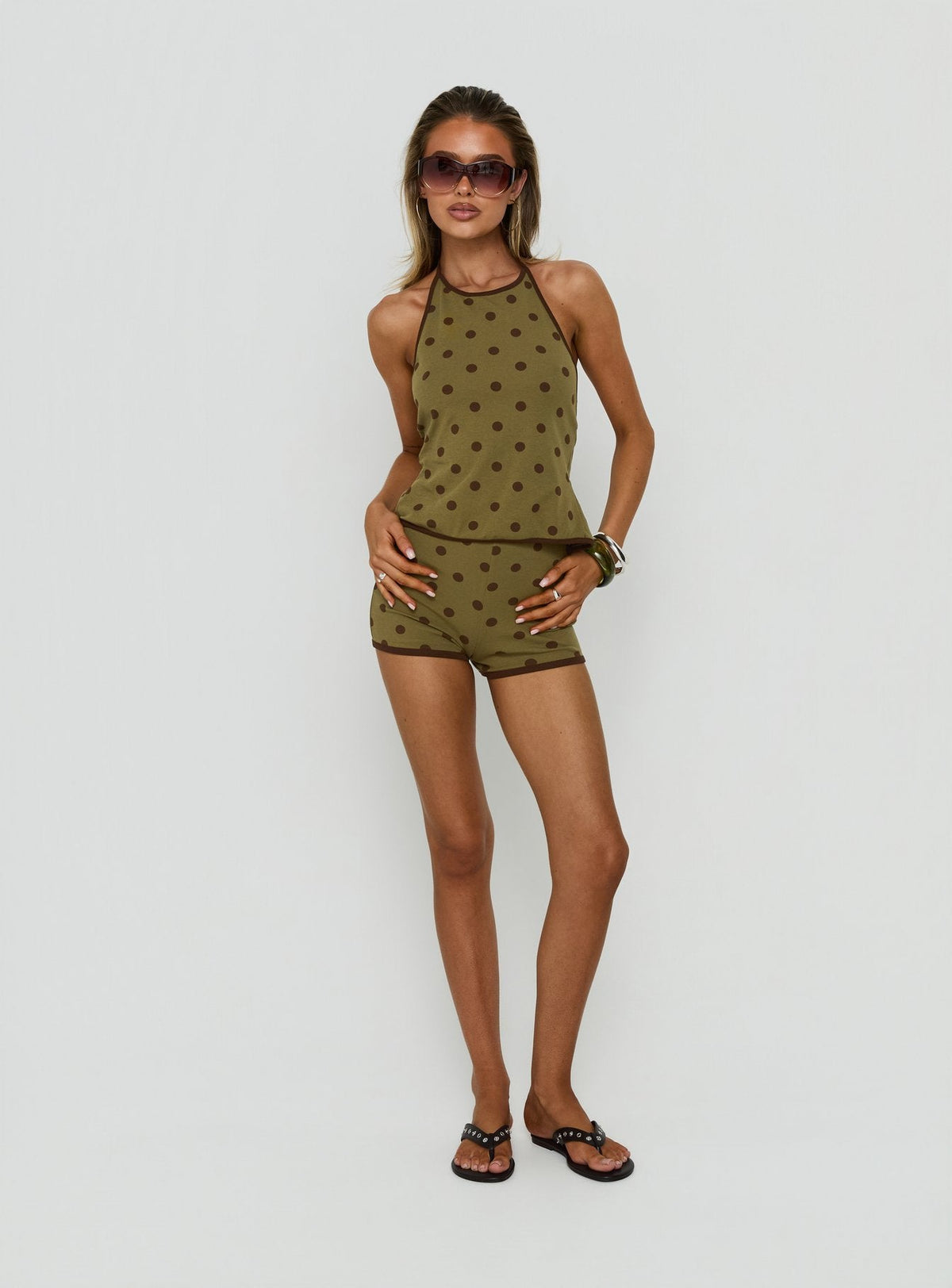 Speranza High-Neck-Neckholder-Top mit grünen Polka Dots