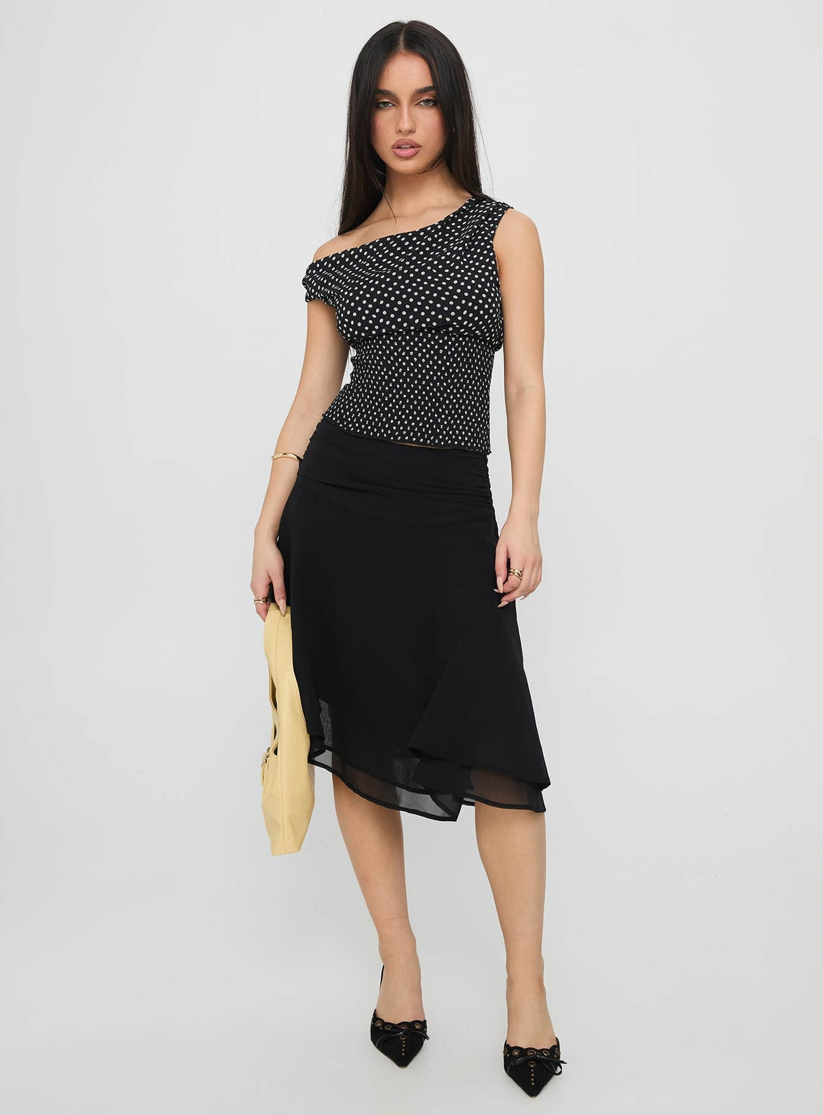   front view of model wearing Princess Polly Evanescence Asymmetrical Midi Skirt Black Midi Skirts 