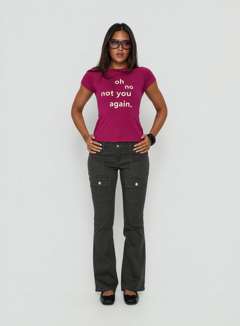 Crafted from charcoal fabric, the Trust Fund Low Rise Bootleg Cargo Pants in womens regular pants, front view of model wearing Princess Polly
