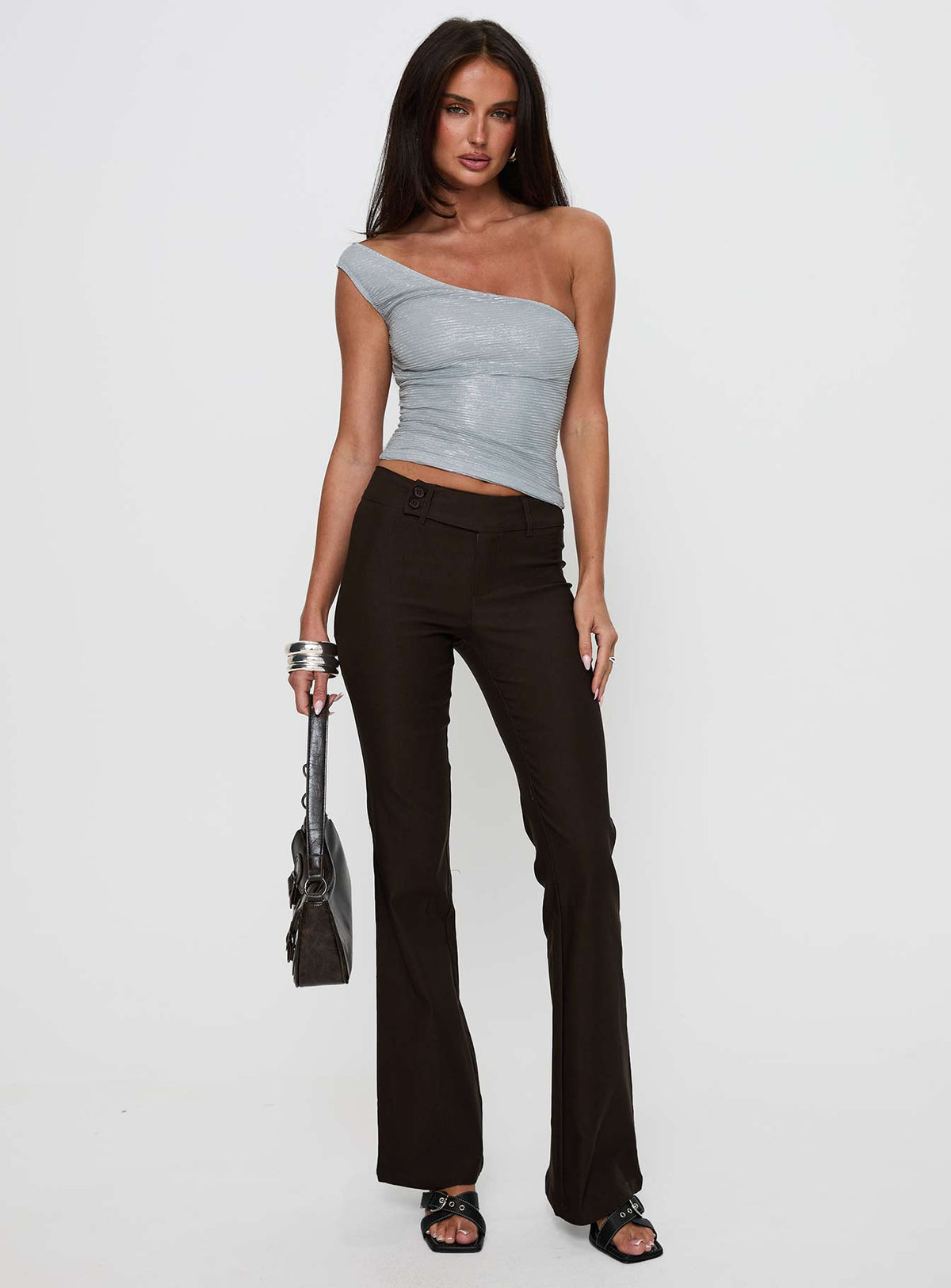 front view of model wearing Princess Polly Kinkirk Flared Pants Chocolate Tall Low Rise Pants 