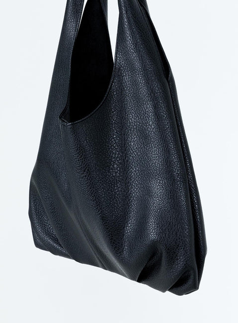 Shoulder bag Faux leather material Twin fixed handles Magnetic button fastening Separate clutch with zip fastening Gold toned hardware