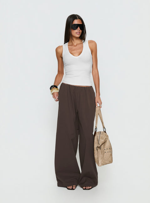Featuring the Lunea Concealed Waistband Pants Brown in womens-regular-pants with mid-rise styling front view of model wearing Princess Polly