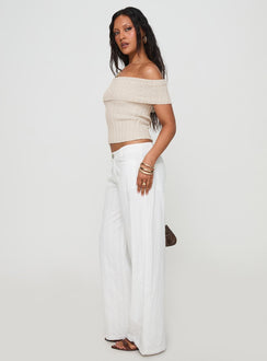 side view of model wearing Princess Polly Vendi Low Rise Pant White Low Rise Pants 