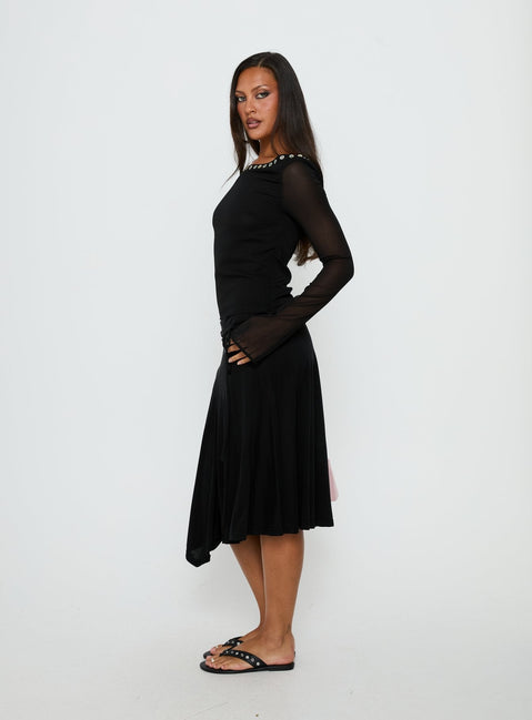   side view of model wearing Princess Polly Joaney Tie Side Jersey Midi Skirt Black Midi Skirts Skirts 