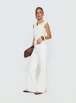 side view of model wearing Princess Polly Buenos No Waist Low Rise Straight Leg Jeans White Mid Rise Jeans 