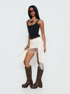   side view of model wearing Princess Polly Winita Macrame Tassel Mini Skirt Cream Mini Skirts Skirts 