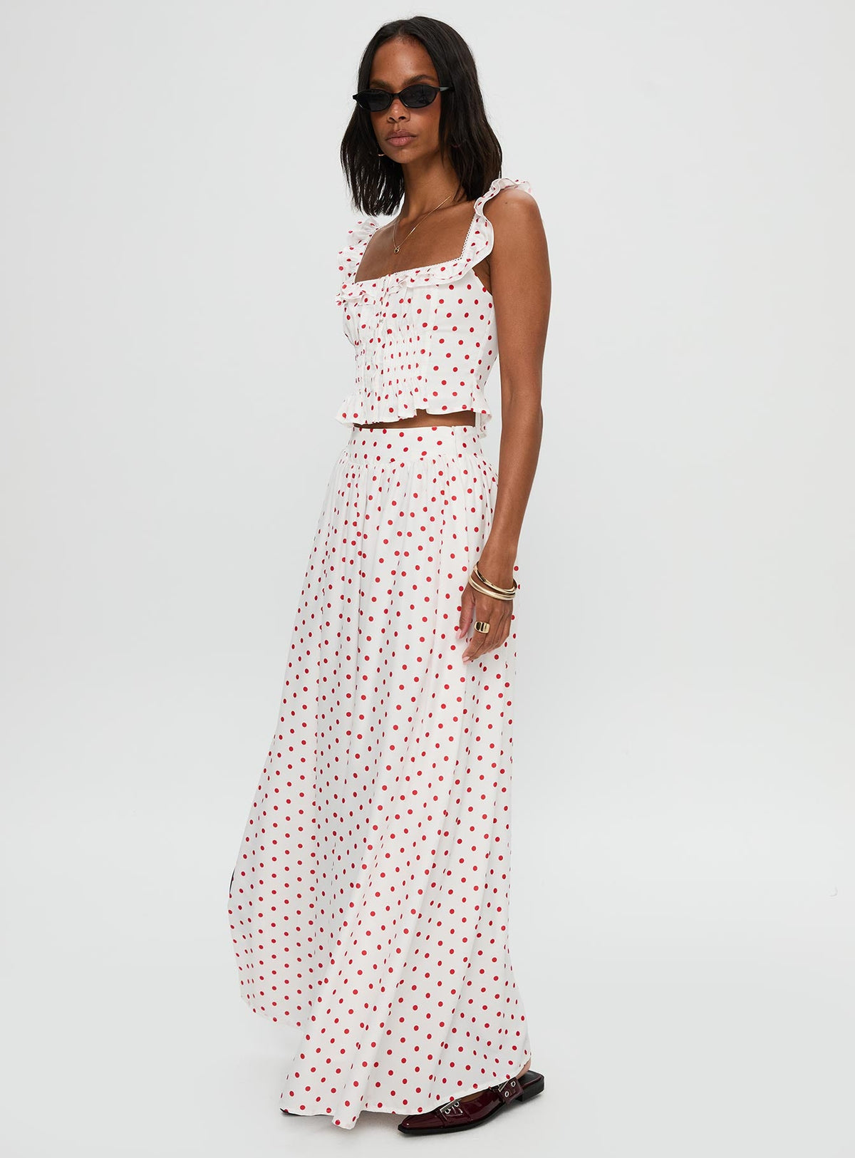   side view of model wearing Princess Polly Valerio Maxi Skirt White / Red Maxi 