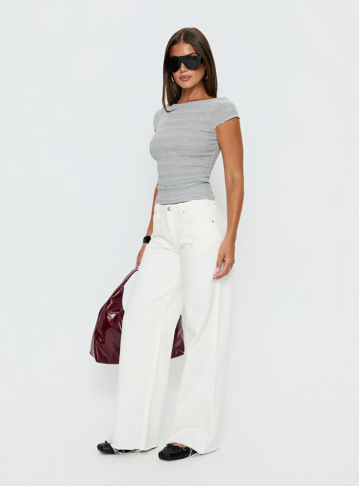 back view of model wearing Princess Polly Darla Low Rise Straight Leg Jean White Low Rise Jeans 