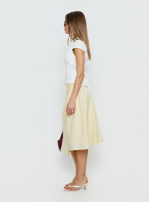  side view of model wearing Princess Polly Sunney Wrap Midi Skirt Yellow Midi Skirts Skirts 
