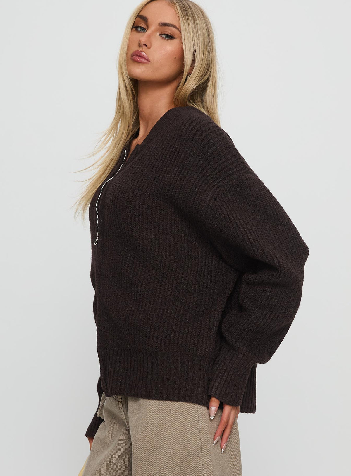 side view of model wearing Princess Polly Lexene Zip Through Jumper Chocolate Longline Jumpers 