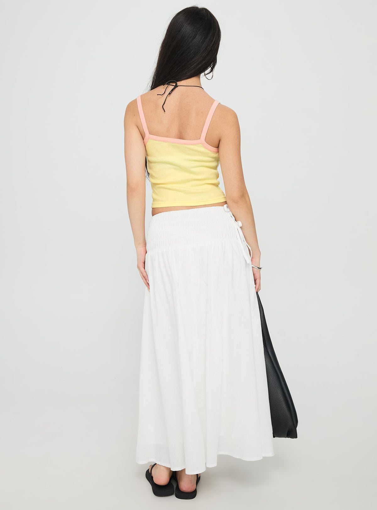 back view of model wearing Princess Polly Vence Ruched Maxi Skirt White Maxi 
