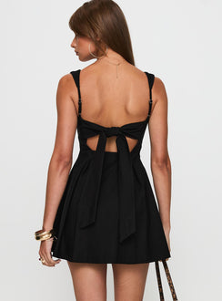 back view of model wearing Princess Polly Xanthus Mini Dress Black Square Neck 