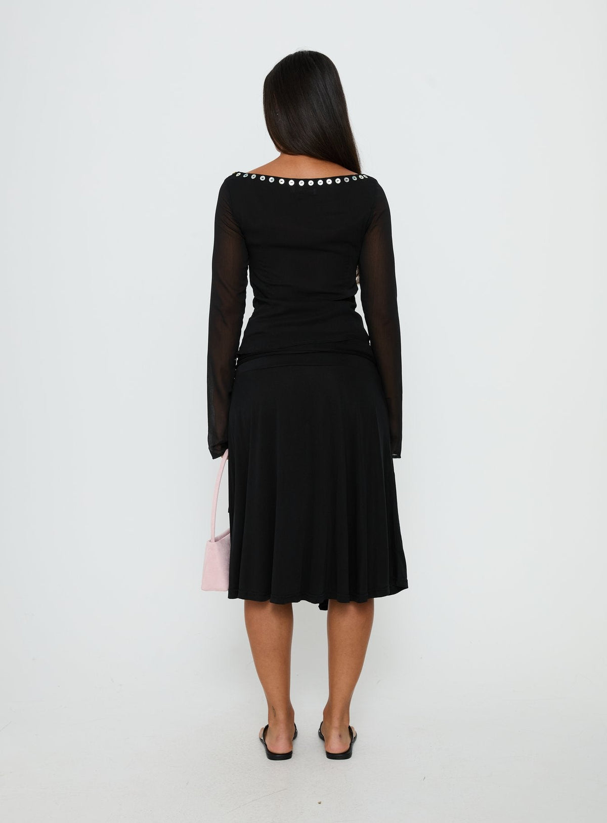 back view of model wearing Princess Polly Joaney Tie Side Jersey Midi Skirt Black Midi Skirts Skirts 