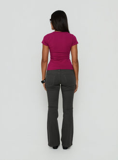 Styled in a low rise design, the Trust Fund Bootleg Cargo Pants Charcoal in womens regular pants, back view of model wearing Princess Polly