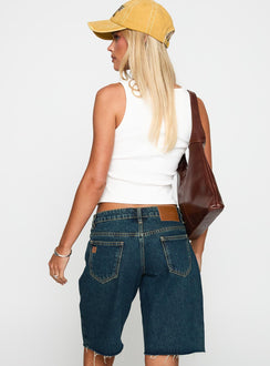 back view of model wearing Princess Polly Cult Classic Longline Denim Shorts Vintage Wash Low Rise Shorts 
