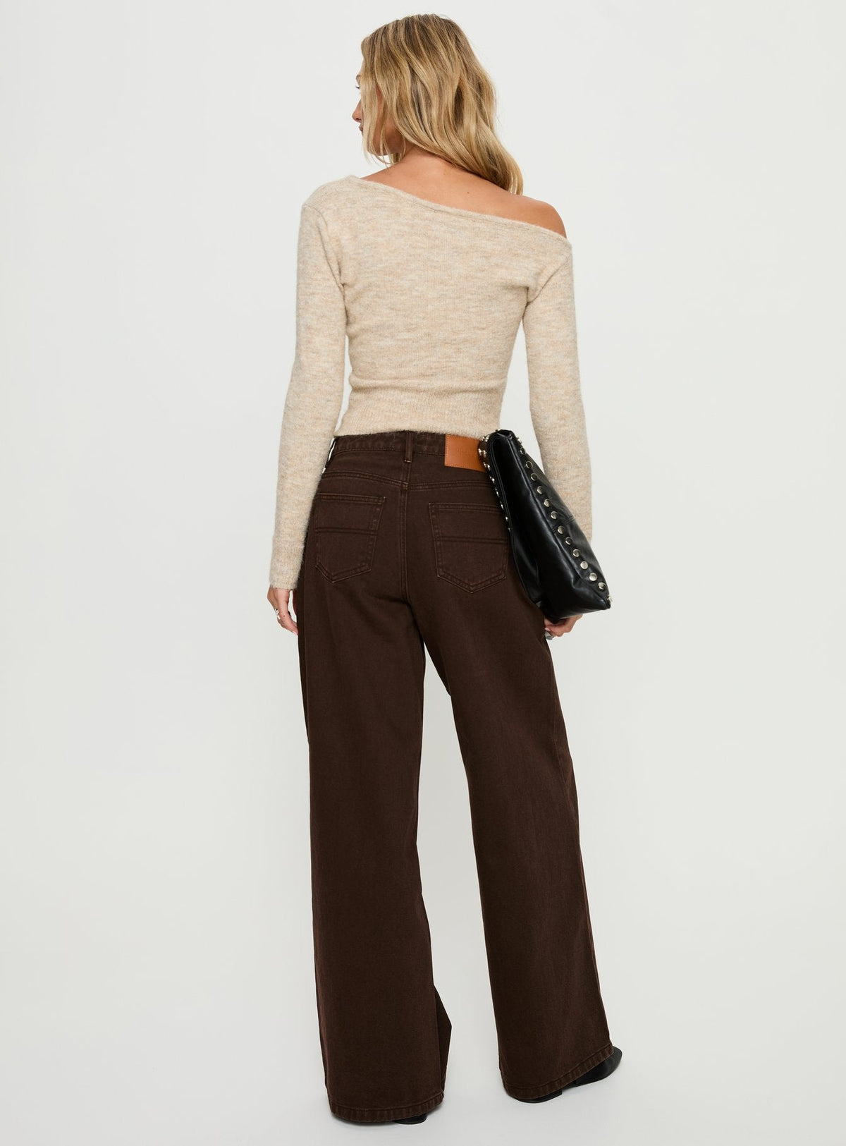 back view of model wearing Princess Polly Naylor Mid Rise Wide Leg Jeans Brown Mid Rise Jeans 