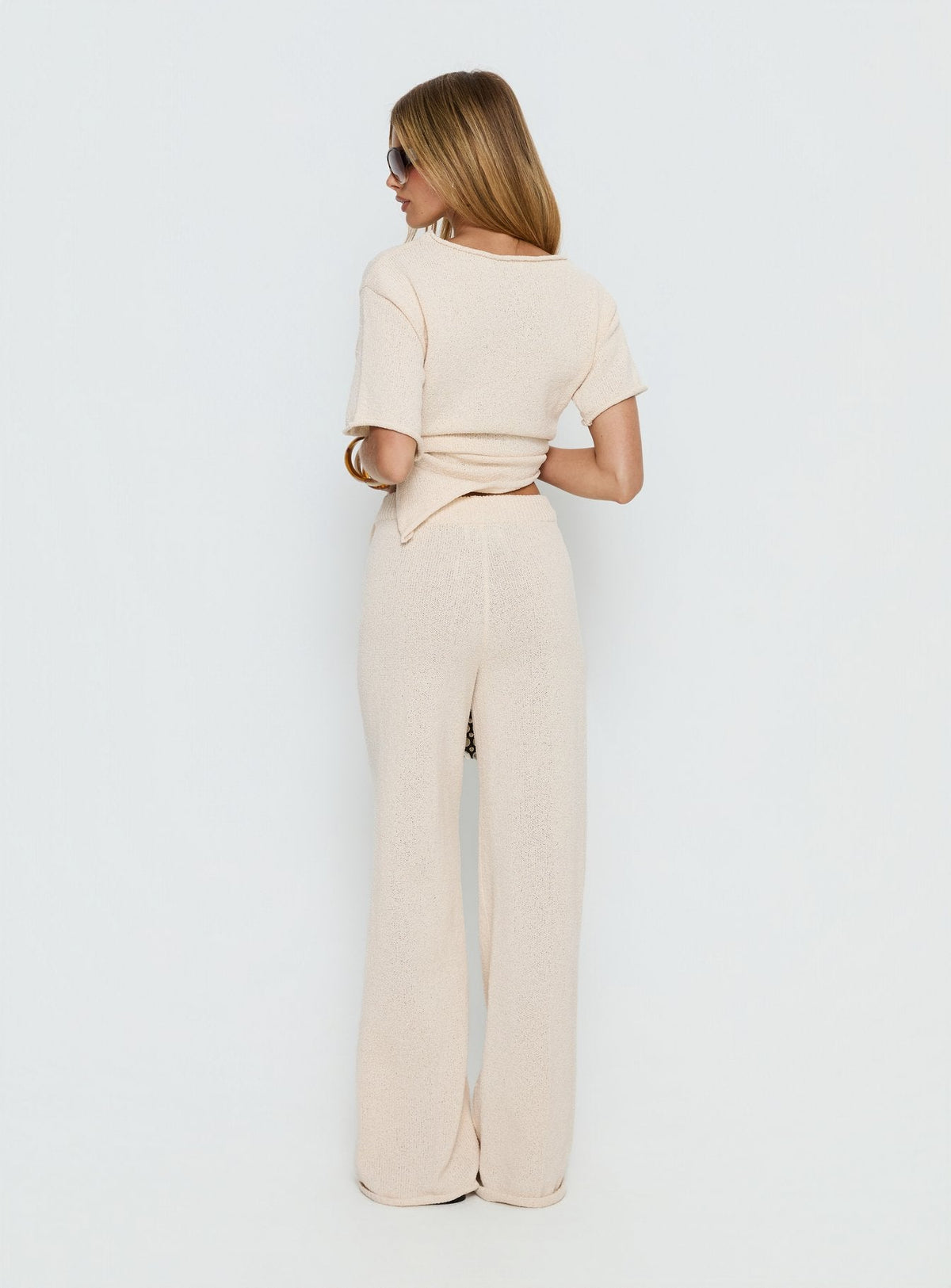 back view of model wearing Princess Polly Calisse Knit Wide Leg Pants Beige High Rise Pants 