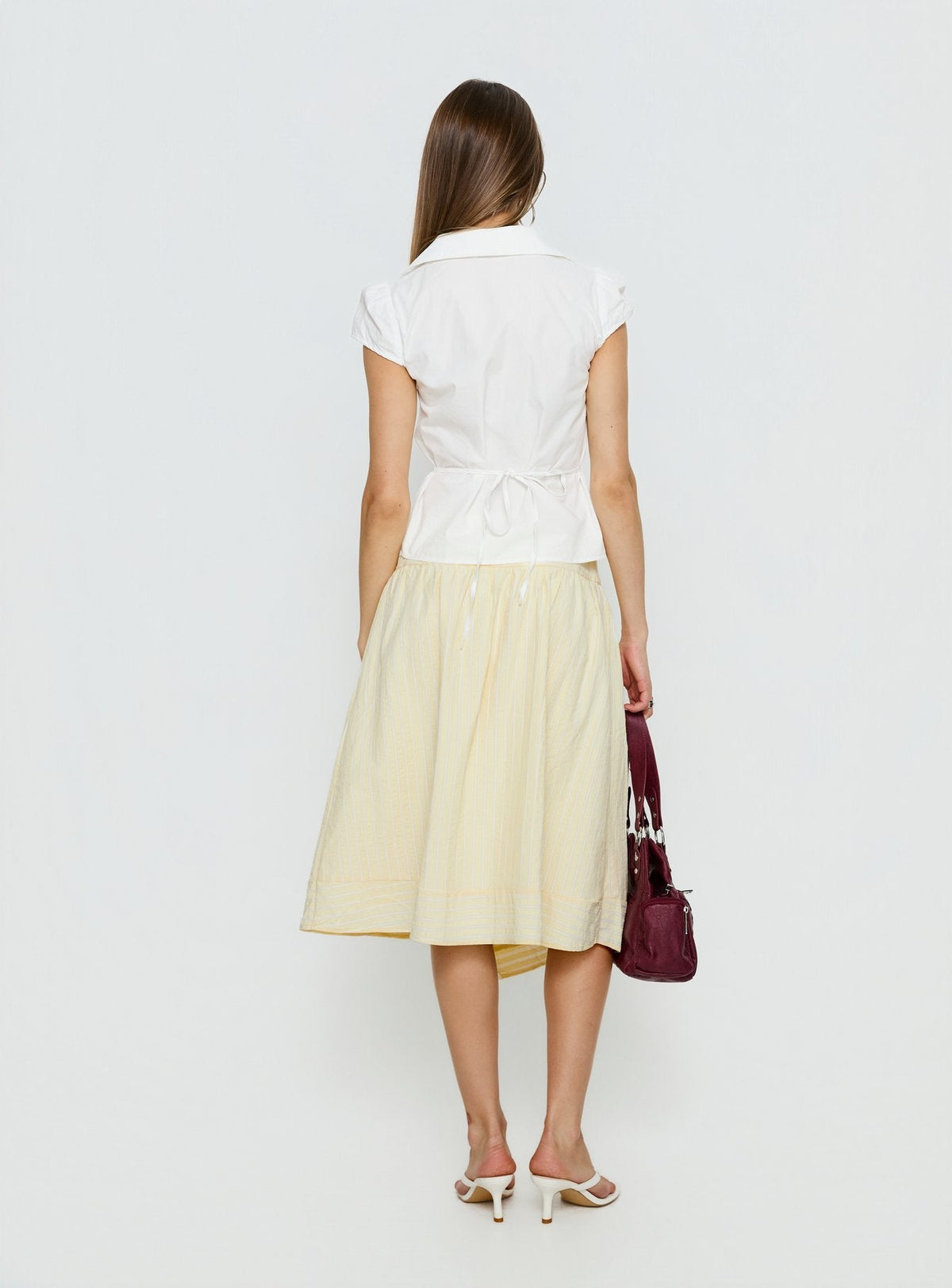 back view of model wearing Princess Polly Sunney Wrap Midi Skirt Yellow Midi Skirts Skirts 