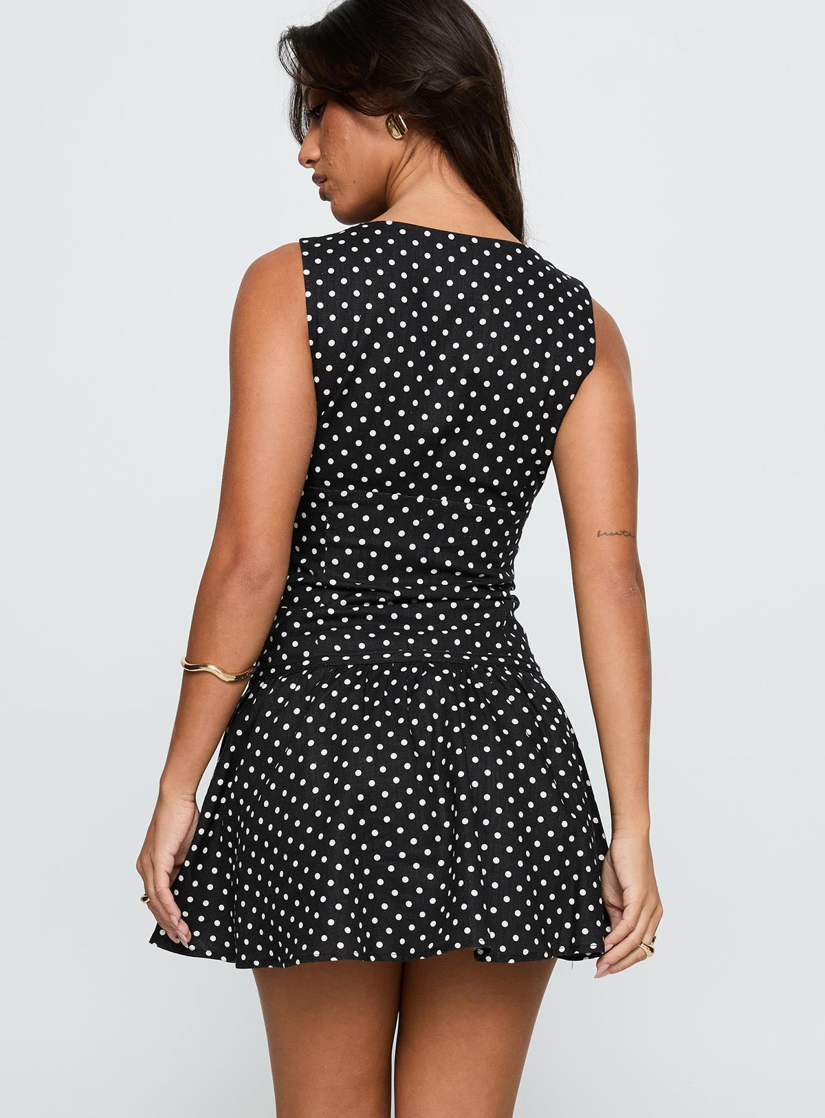 back view of model wearing Princess Polly Alissea Keyhole Linen Blend Mini Dress Black Polka Crew Neck 
