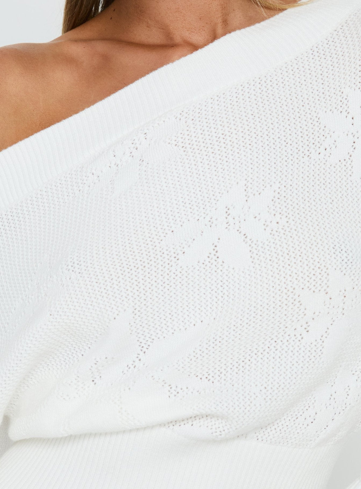 Showcasing the Lalola Asymmetrical Knit Jumper White womens jumpers in short length product Princess Polly