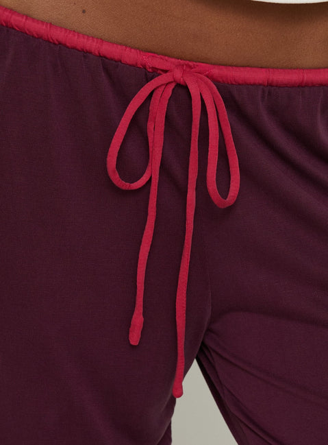Close-up of Jessika Ultra Low Pants Red / Plum womens-regular-pants low-rise drawstring product