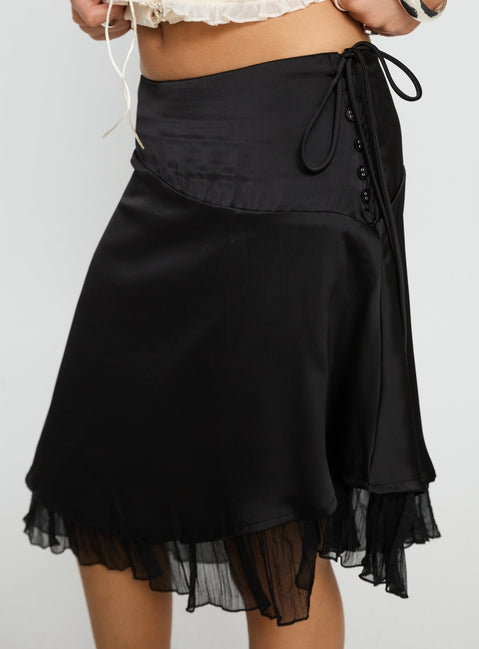 back view of model wearing Princess Polly Rosemead Satin Midi Skirt Black Midi Skirts 
