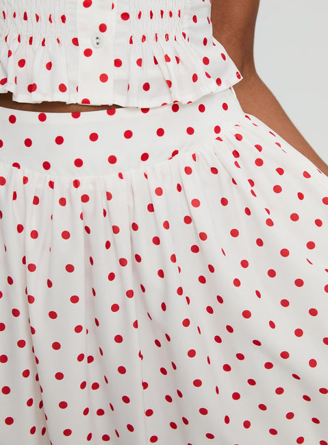   side view of model wearing Princess Polly Valerio Maxi Skirt White / Red Maxi 
