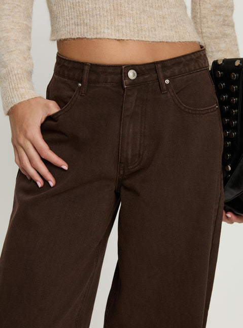back view of model wearing Princess Polly Naylor Mid Rise Wide Leg Jeans Brown Mid Rise Jeans 