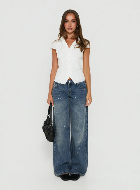 Showcasing the Ellanor Low Rise Paint Straight Leg Jean Vintage Mid Blue in womens-jeans featuring low-rise waist front view of model wearing Princess Polly