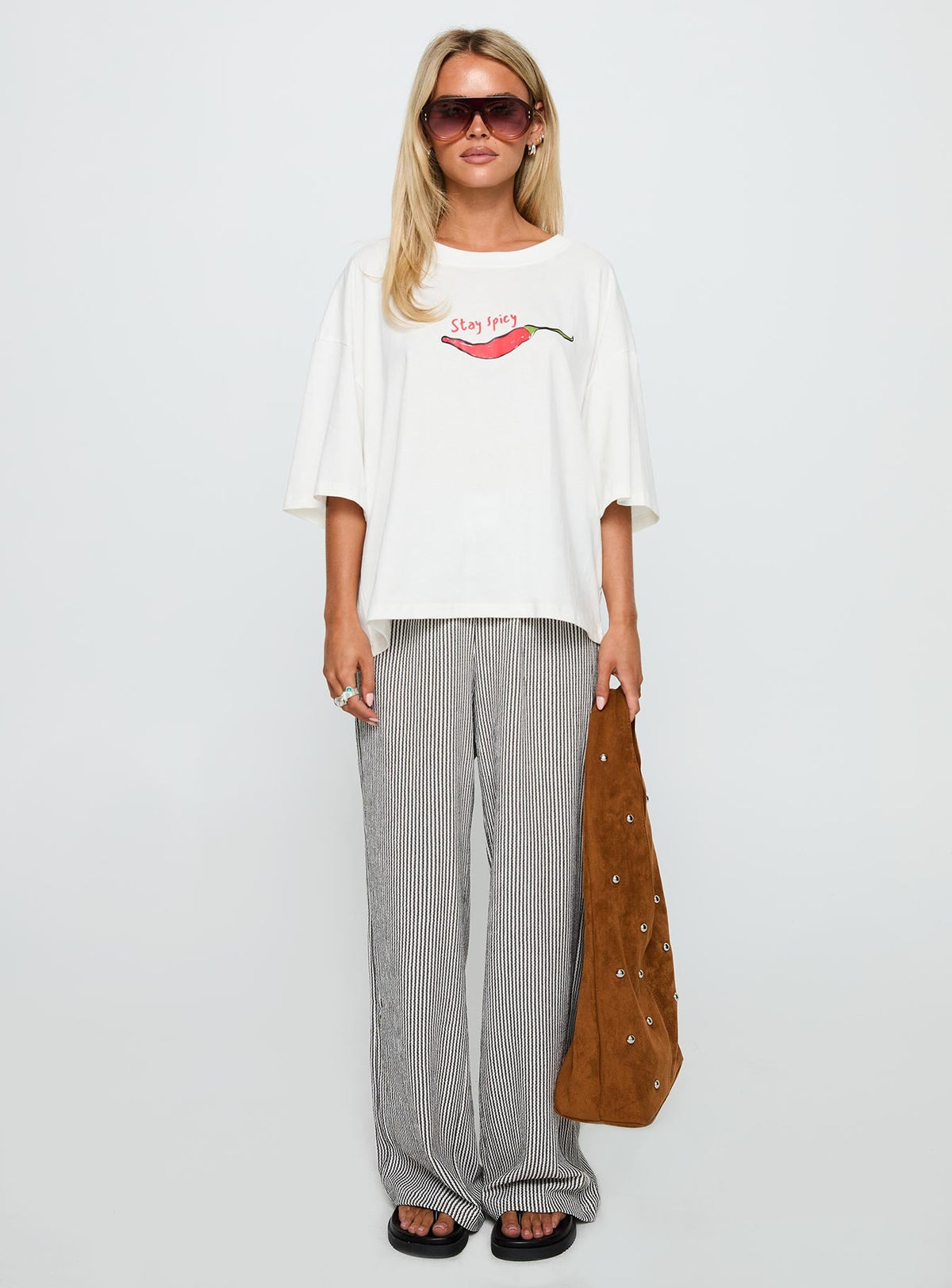 front view of model wearing Princess Polly Stay Spicy Graphic Top White Half Sleeves Crew Neck 