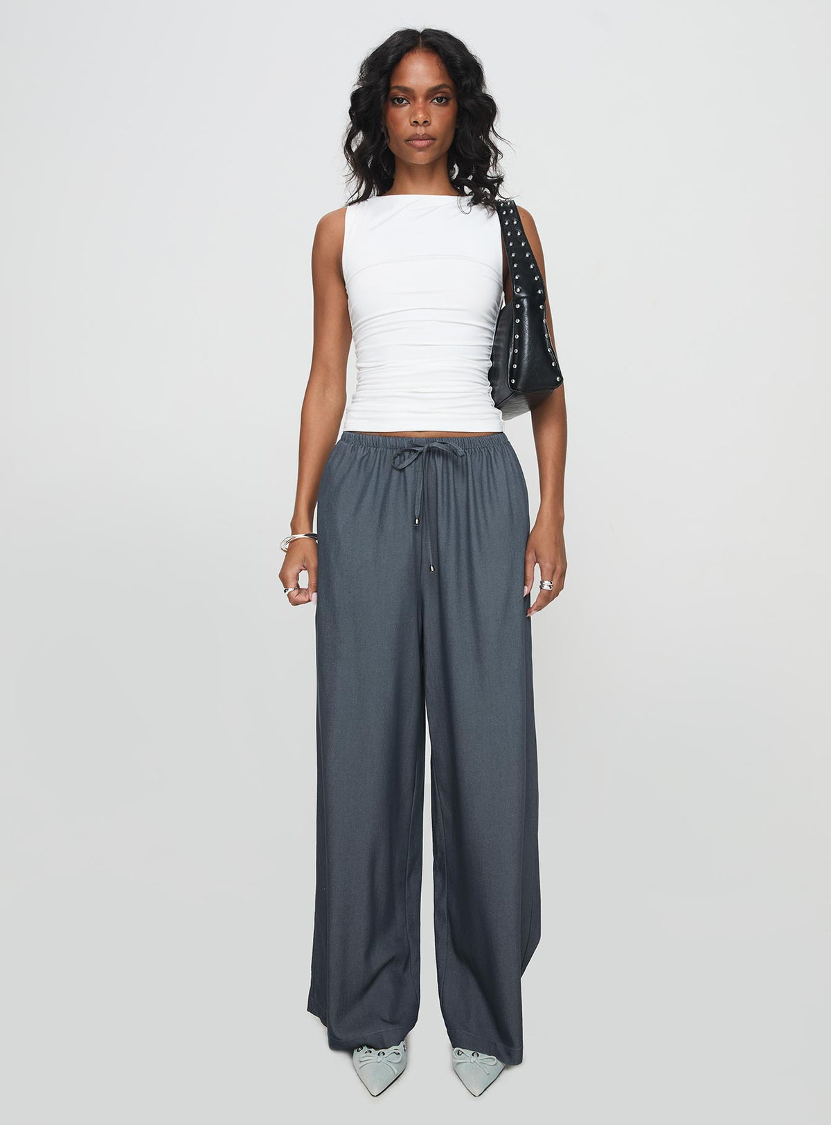 front view of model wearing Princess Polly Solani Top White Sleeveless High Neck 