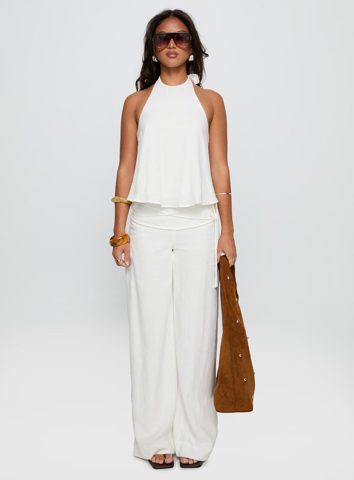 front view of model wearing Princess Polly Aquaria Halter Linen Blend Top White Sleeveless Crew Neck 