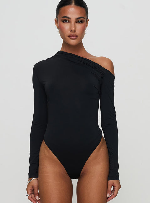 front view of model wearing Princess Polly Antilles One Shoulder Bodysuit Black Long Sleeve Tops Bodysuit 