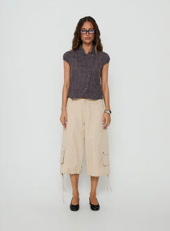 Featuring the Relaxer 3/4 Cargo Pants Beige in womens regular pants with mid-rise front view of model wearing Princess Polly