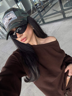 Featuring the Wellness Off The Shoulder Jumper Brown in women's jumpers with boat neckline detail view of model wearing Princess Polly